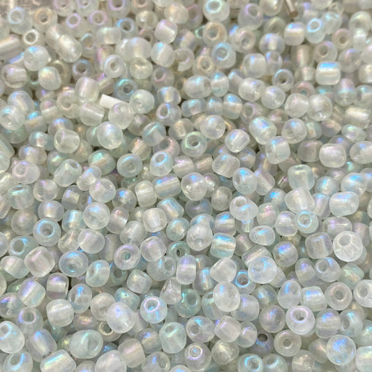 X10gr Perle Rocaille transparent irisé 4mm #56