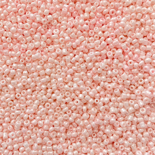 X10gr Perle Rocaille blanc rosé nacré 2mm #46