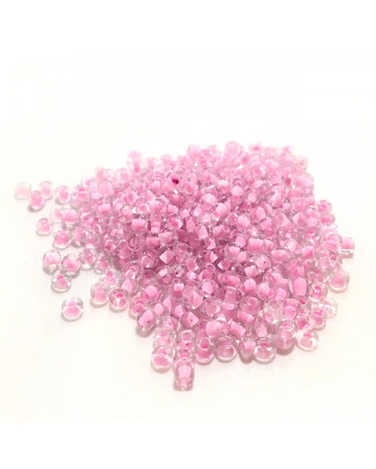 X10gr Perle Rocaille transparent fond rose 2mm #20